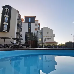 4* מלון Village
